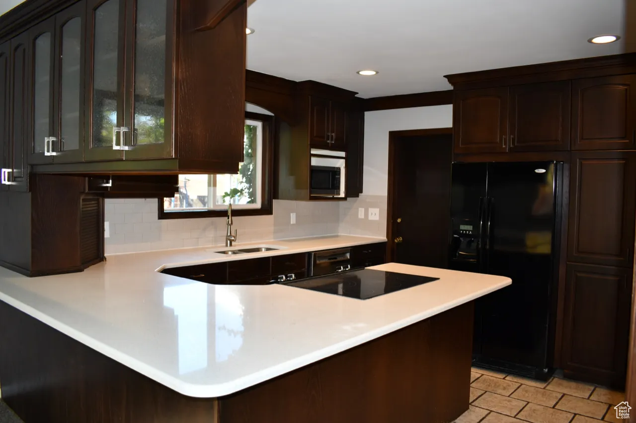 Upstairs kitchen with large Quartz countertops.