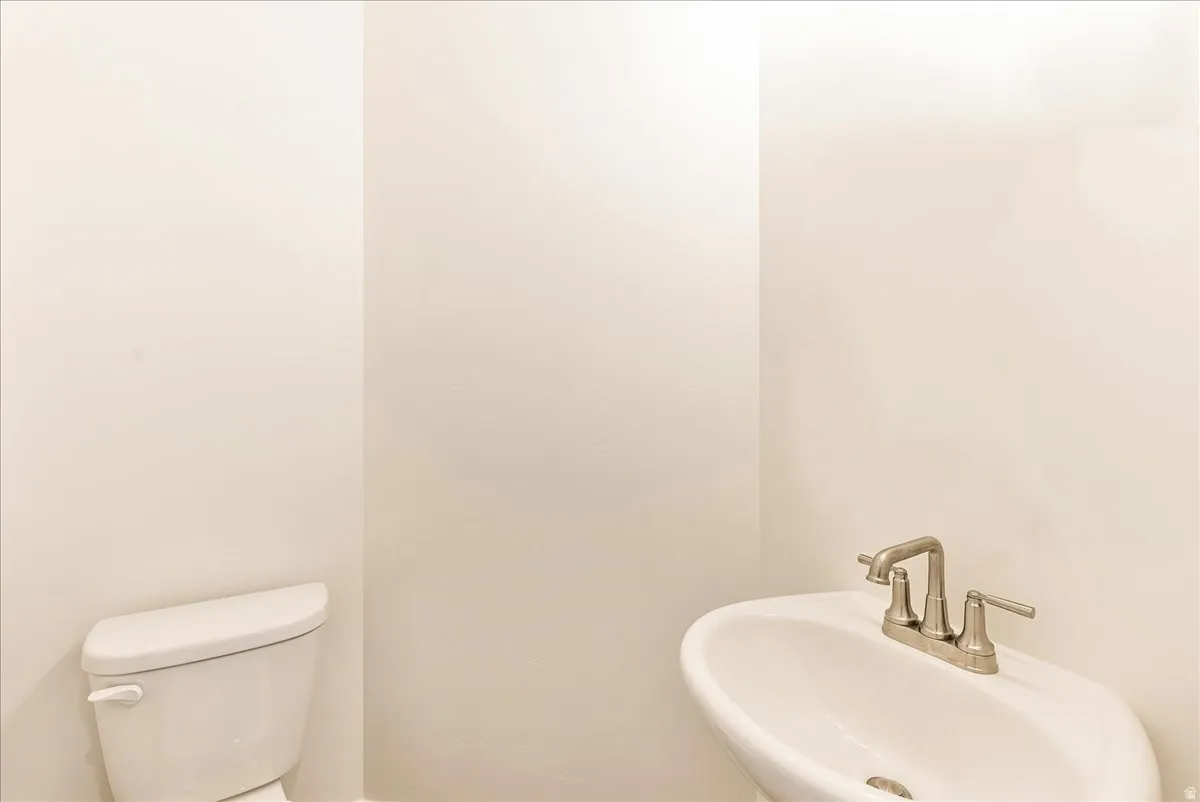 Bathroom featuring a sink and toilet