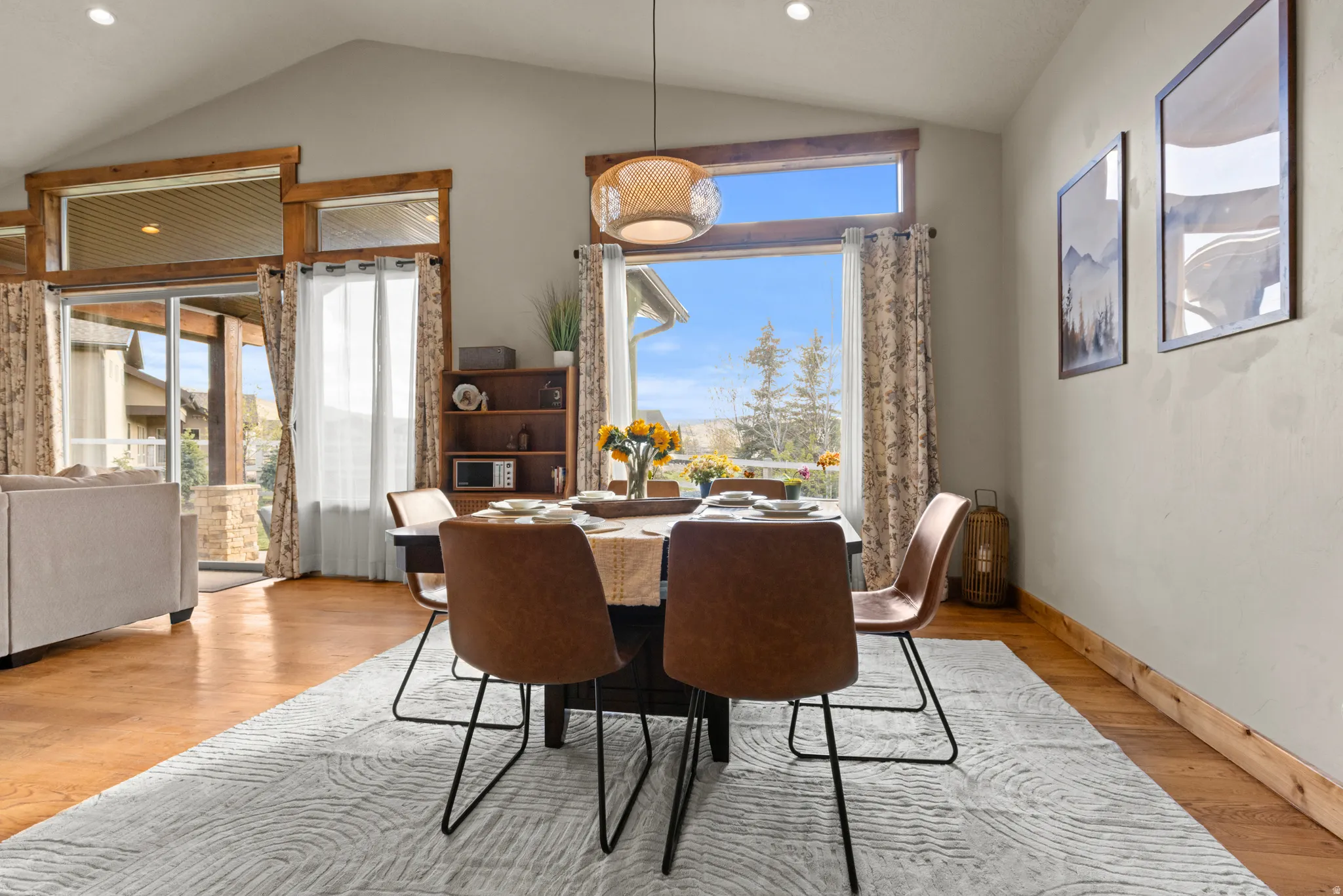 Dining space featuring light wood-style floors and recessed lighting