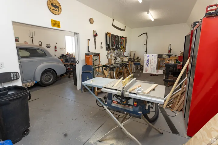 Garage featuring a workshop area