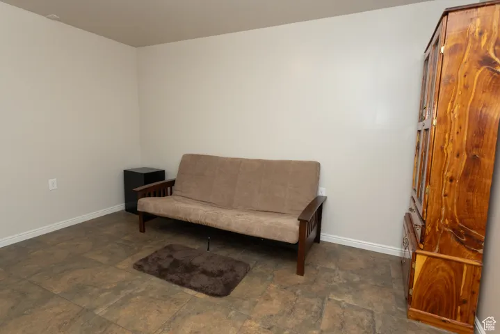 Living area featuring stone finish flooring