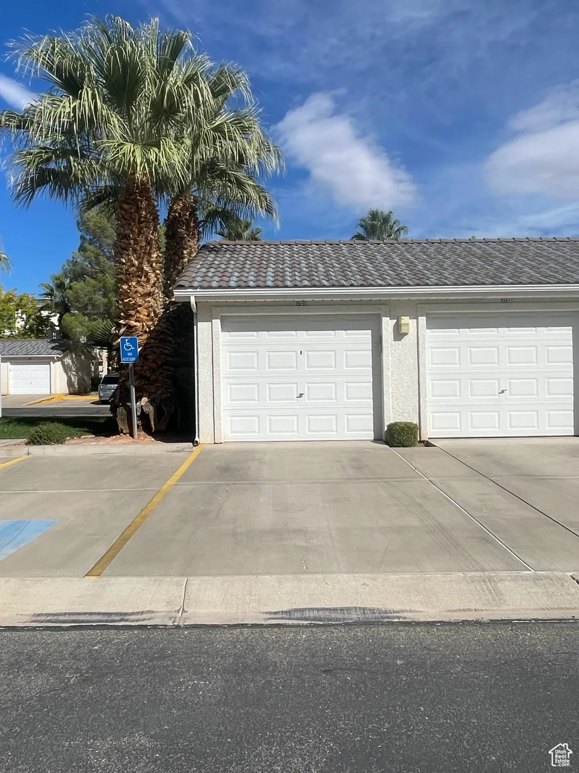 Garage featuring driveway