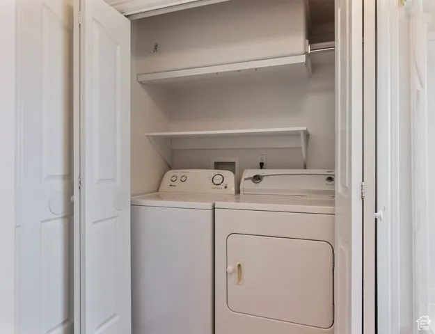 Laundry area featuring washer and clothes dryer
