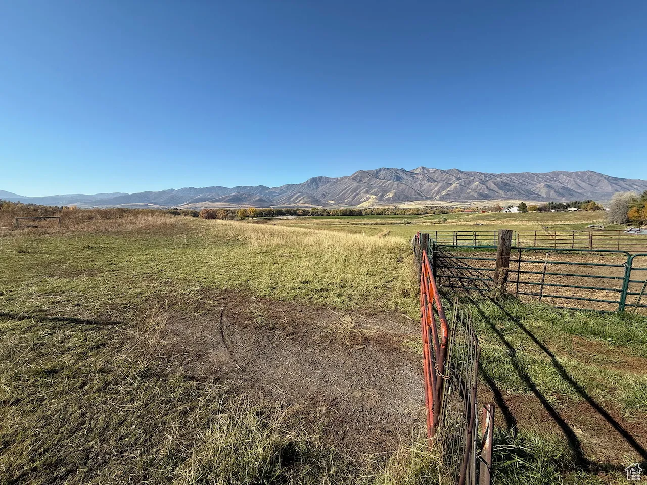 View of mountain background featuring rural landscape and agricultural land