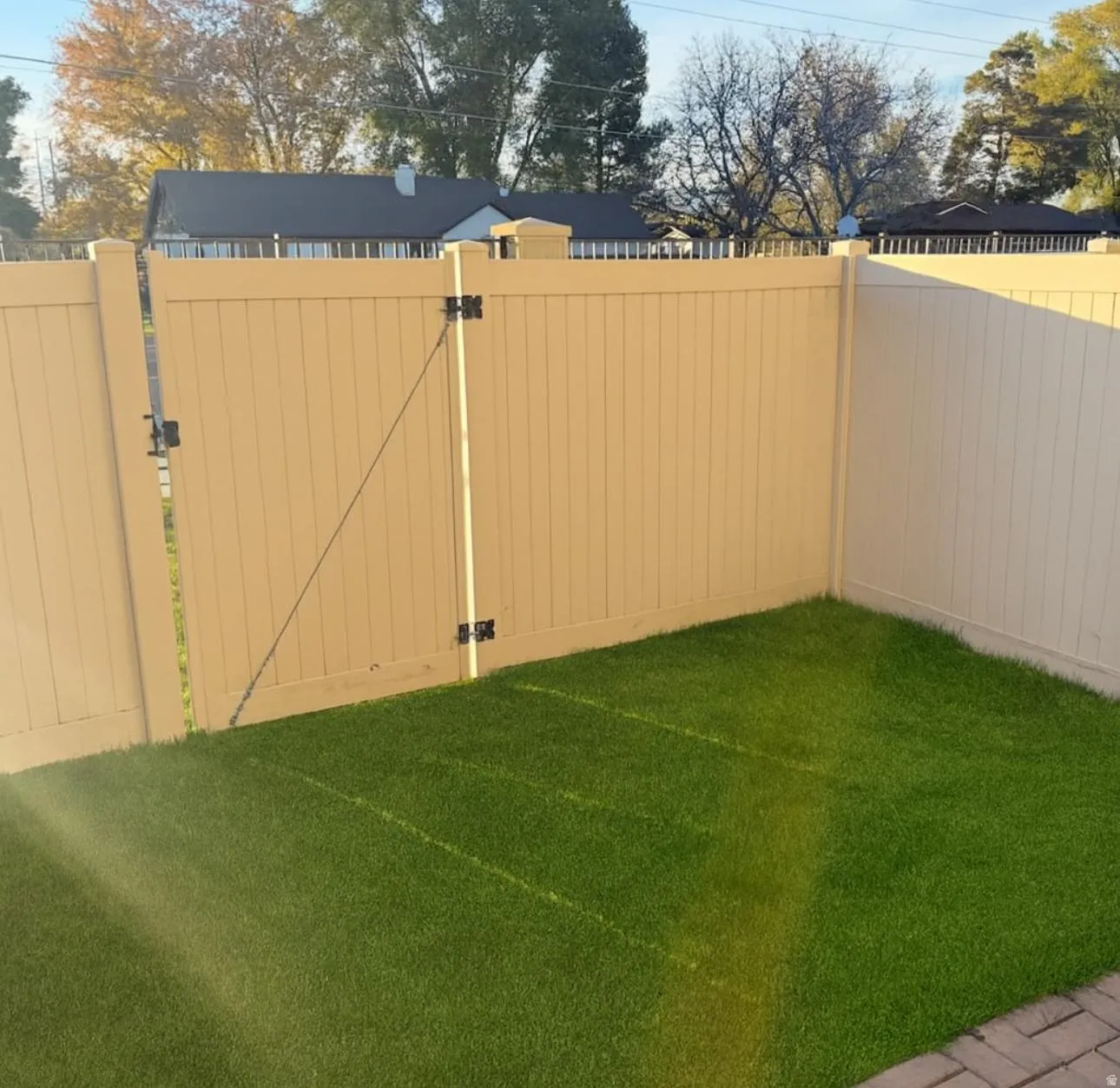 View of yard with a gate