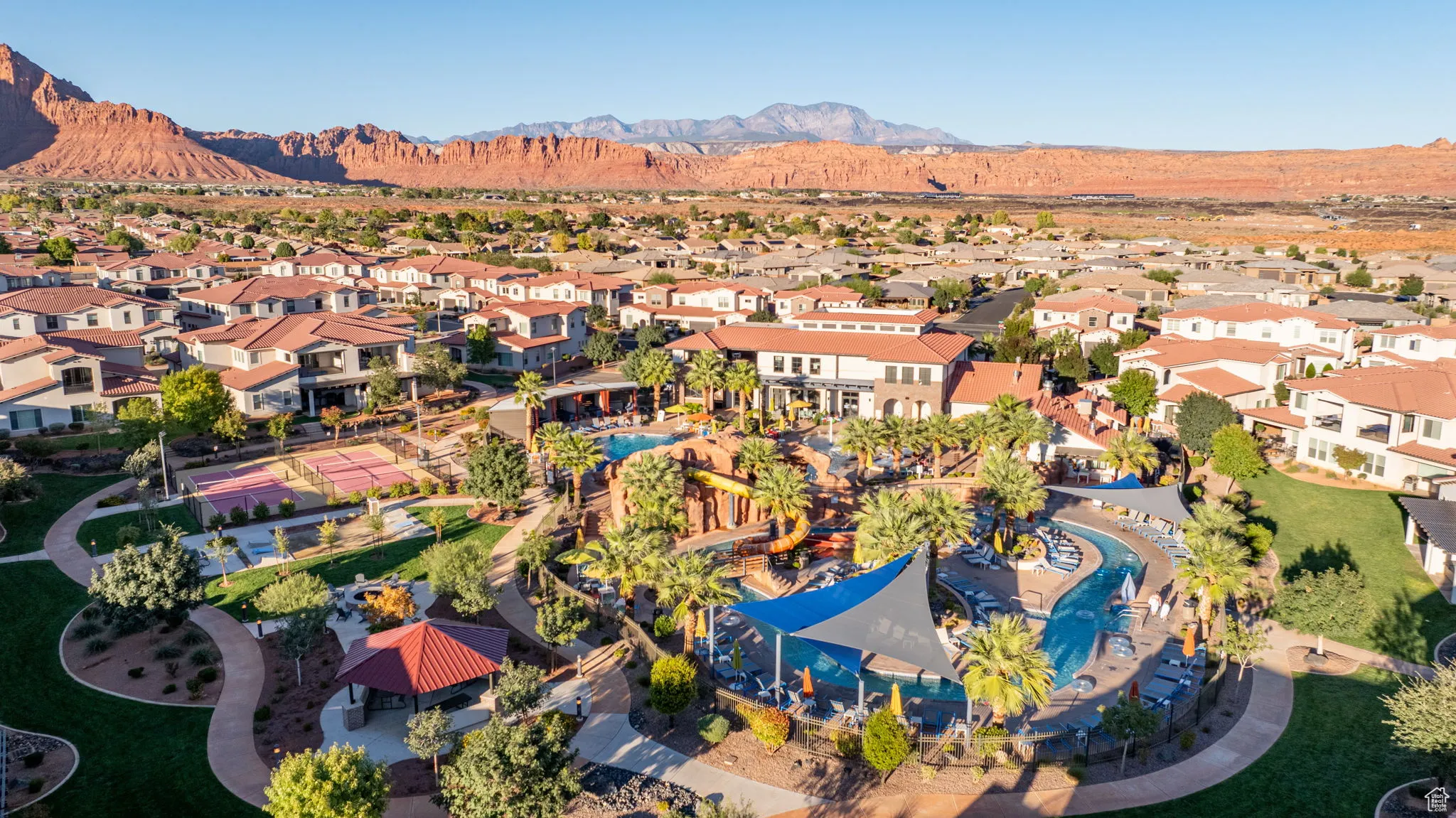 Aerial view of residential area featuring mountains