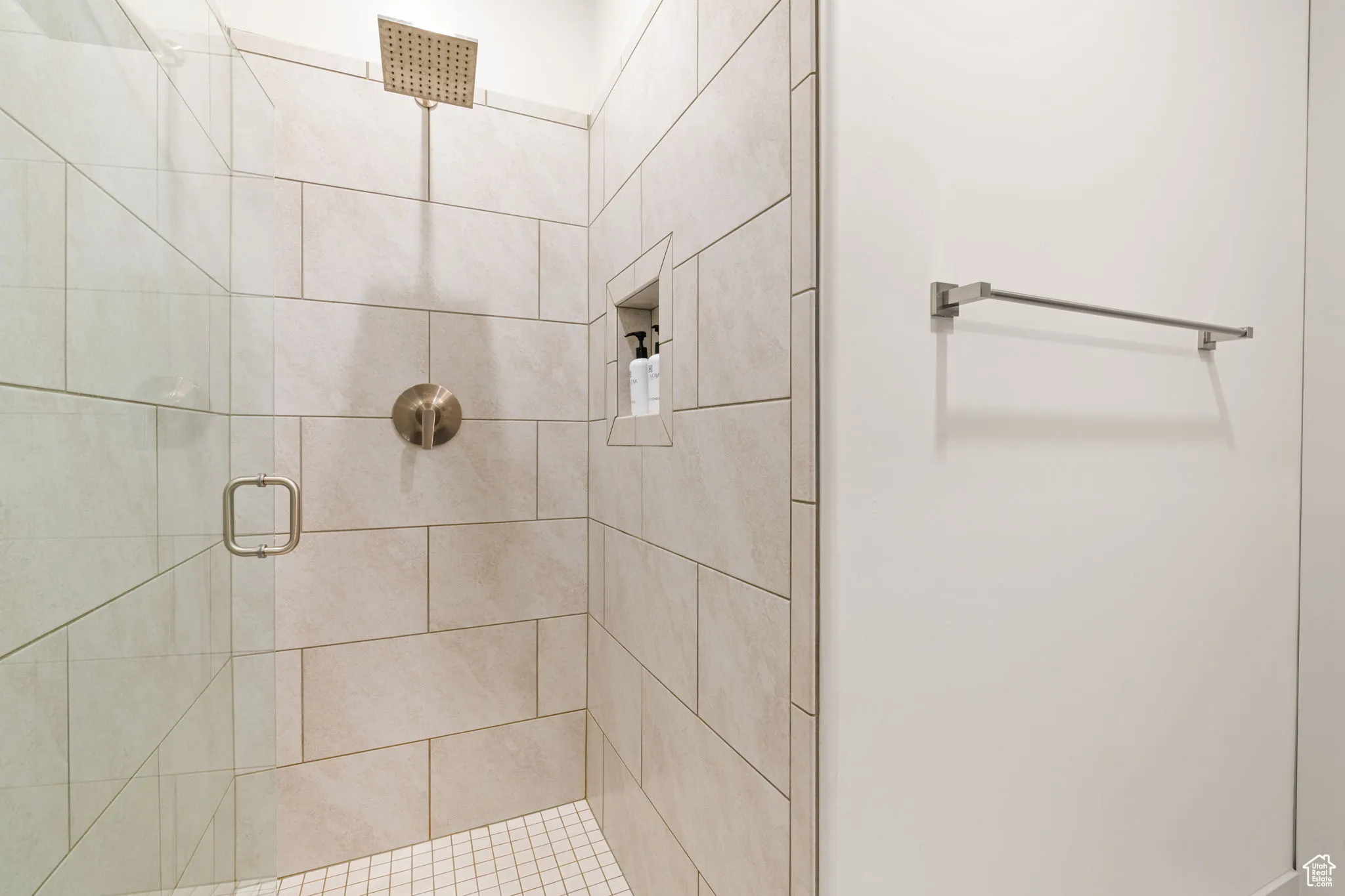 Full bathroom with a stall shower
