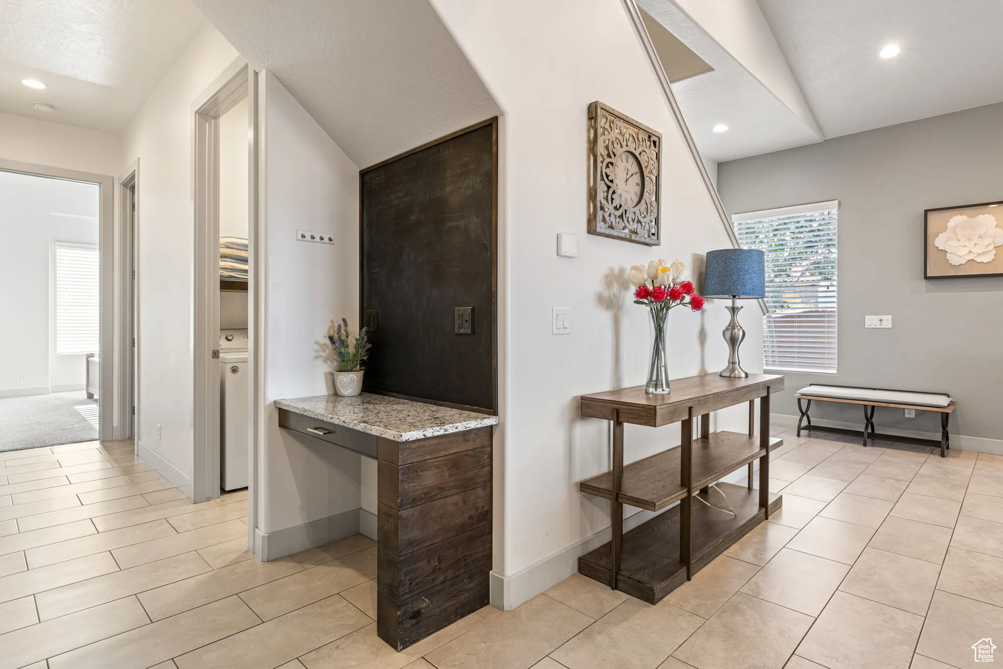 Hallway with recessed lighting and light tile patterned flooring