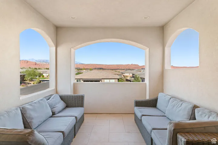 Patio / terrace featuring outdoor lounge area and a mountain view