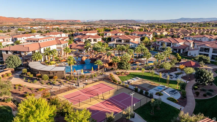 Aerial perspective of suburban area with a mountain backdrop