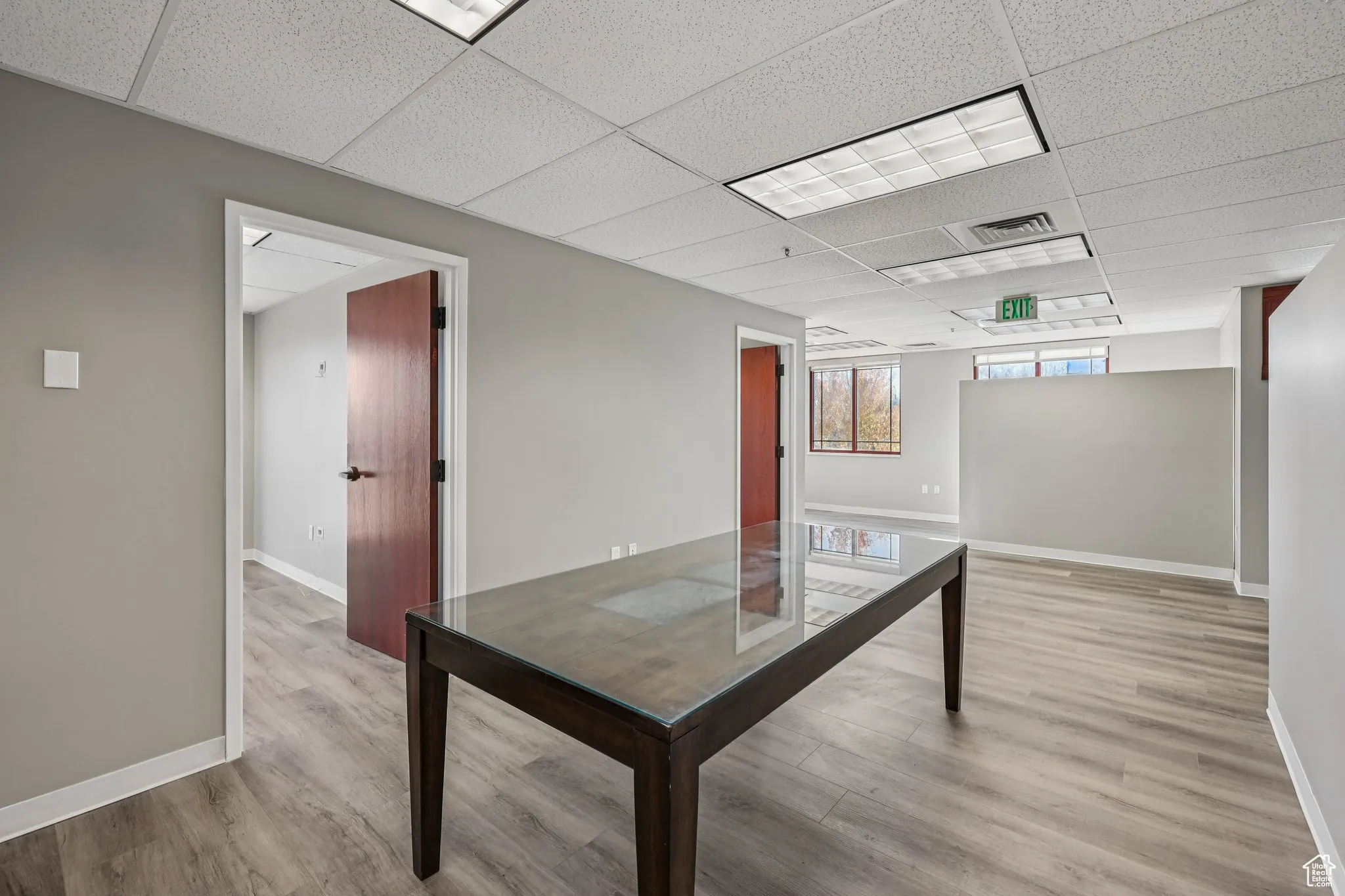 Unfurnished office with a paneled ceiling