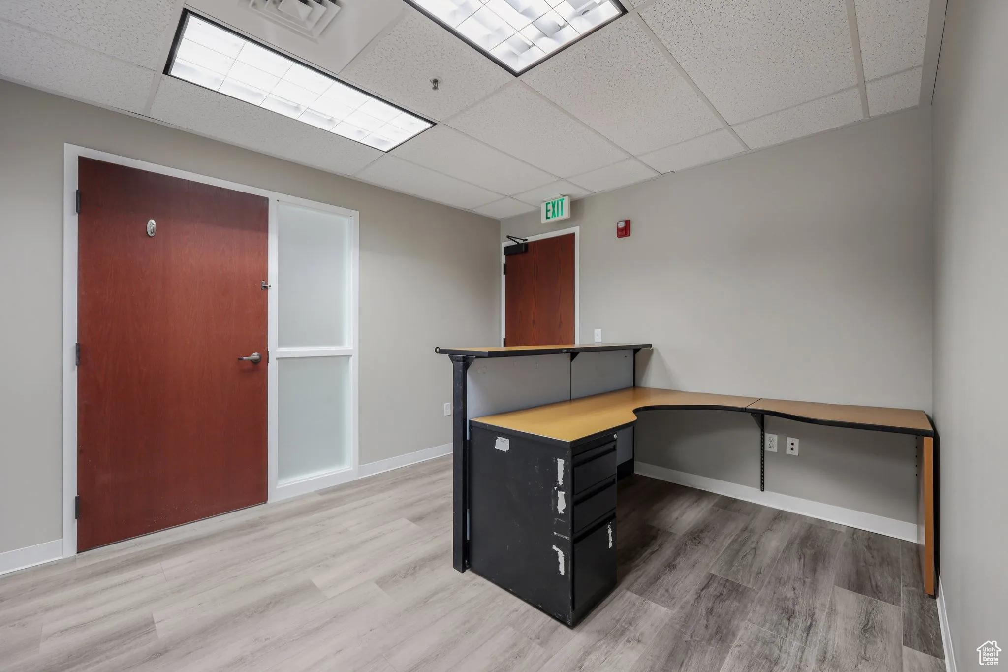 Unfurnished office featuring a paneled ceiling