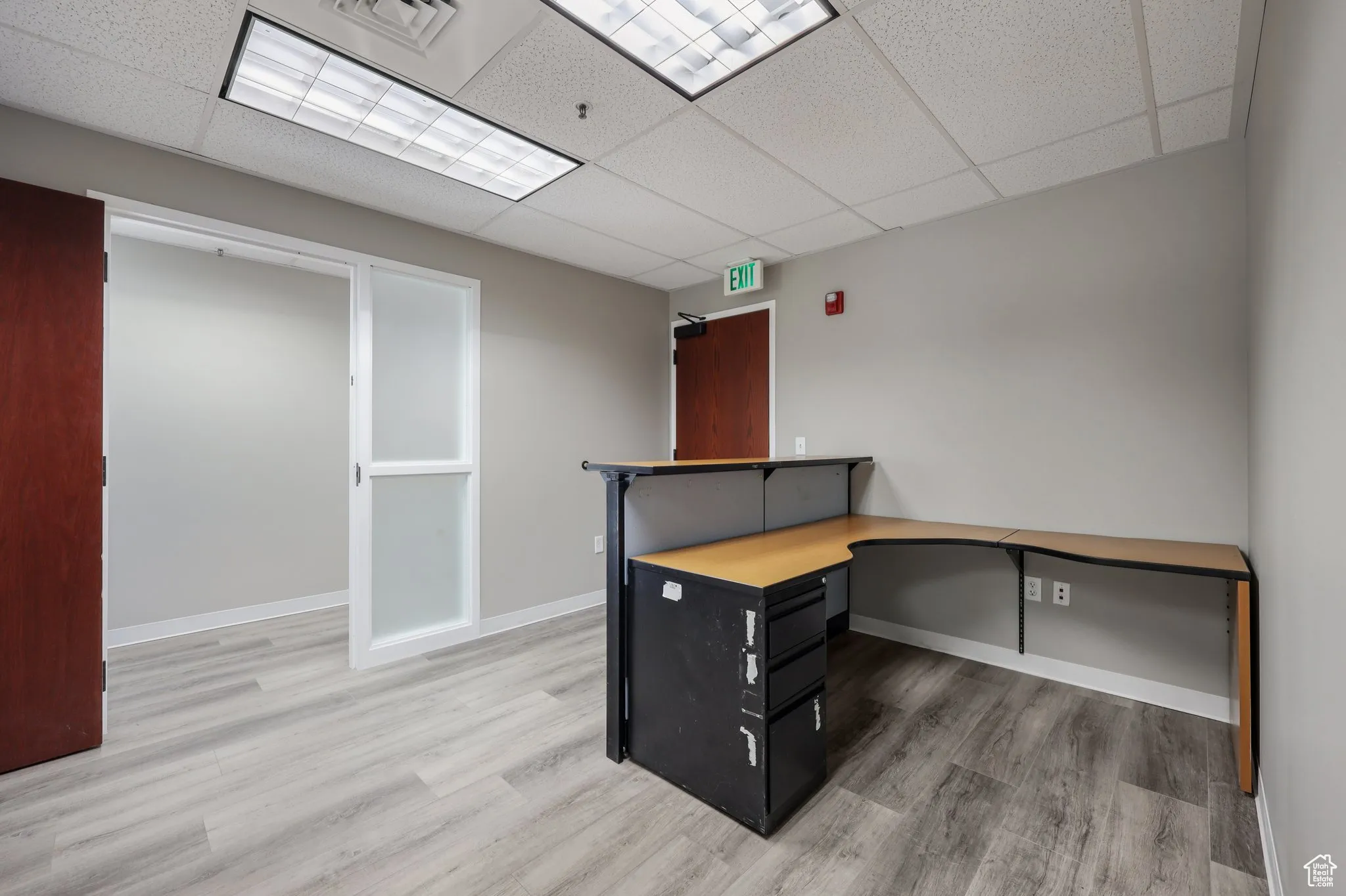 Unfurnished office with a drop ceiling