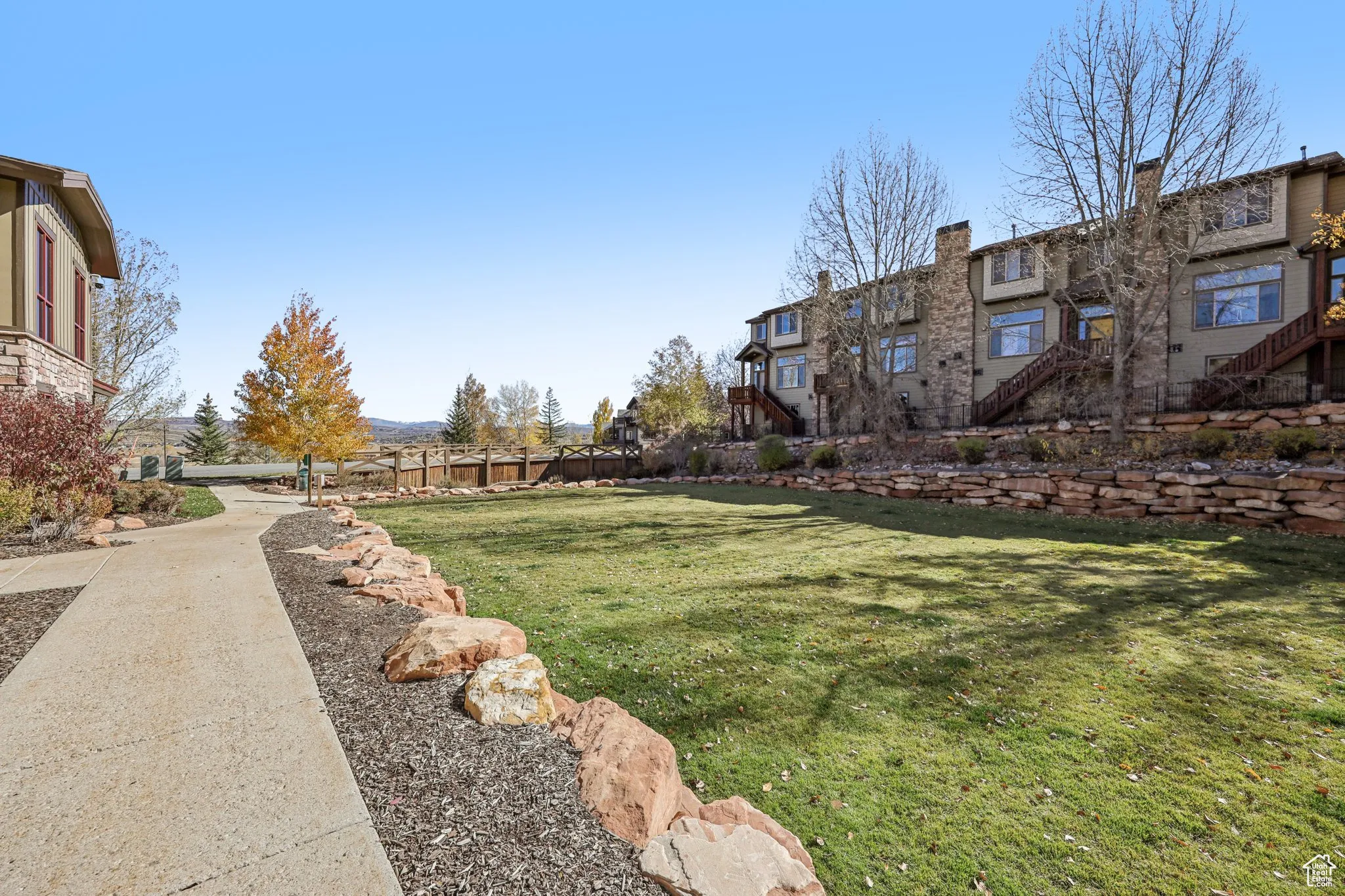 View of property's community featuring stairway