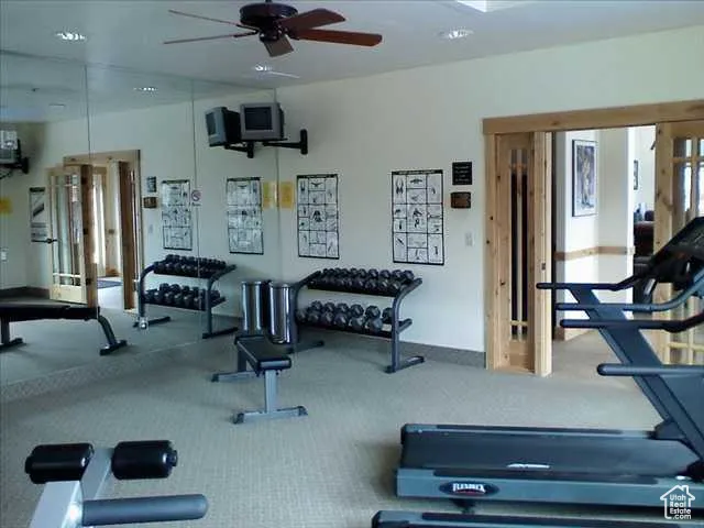 Workout area with ceiling fan