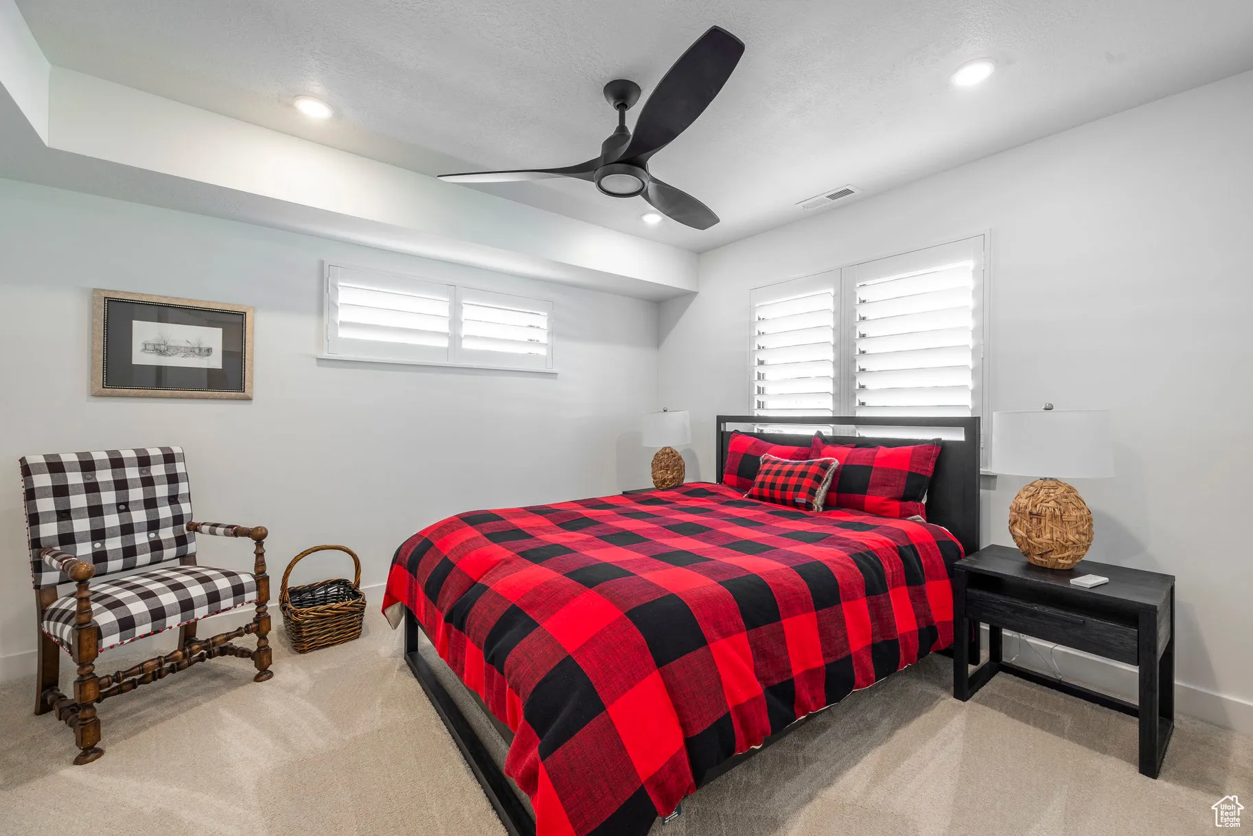 Bedroom with light carpet, ceiling fan, recessed lighting, and a textured ceiling