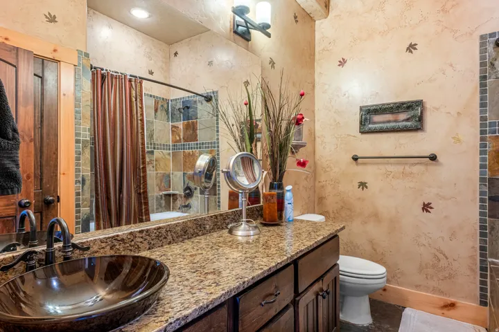 Bathroom with vanity and toilet