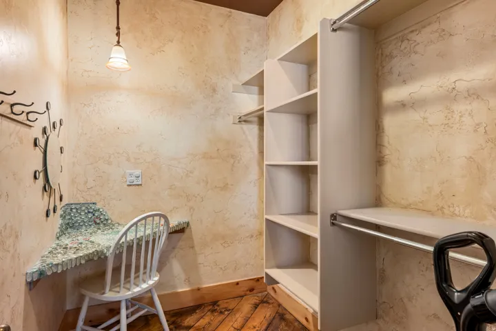 Spacious closet featuring hardwood / wood-style flooring