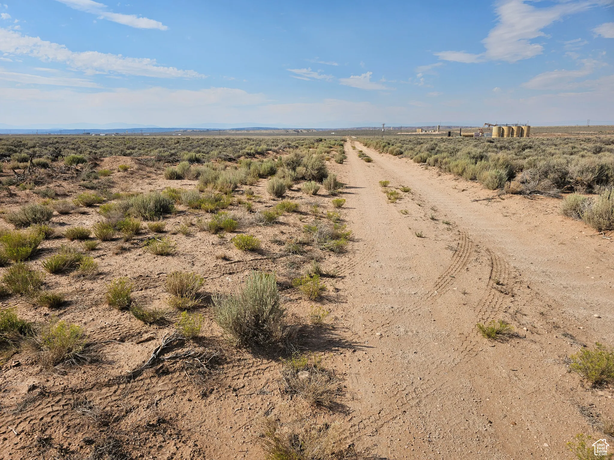 View of street featuring a rural view and view of desert landscape