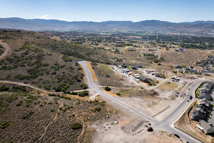 View of property location with a mountain backdrop and rural landscape