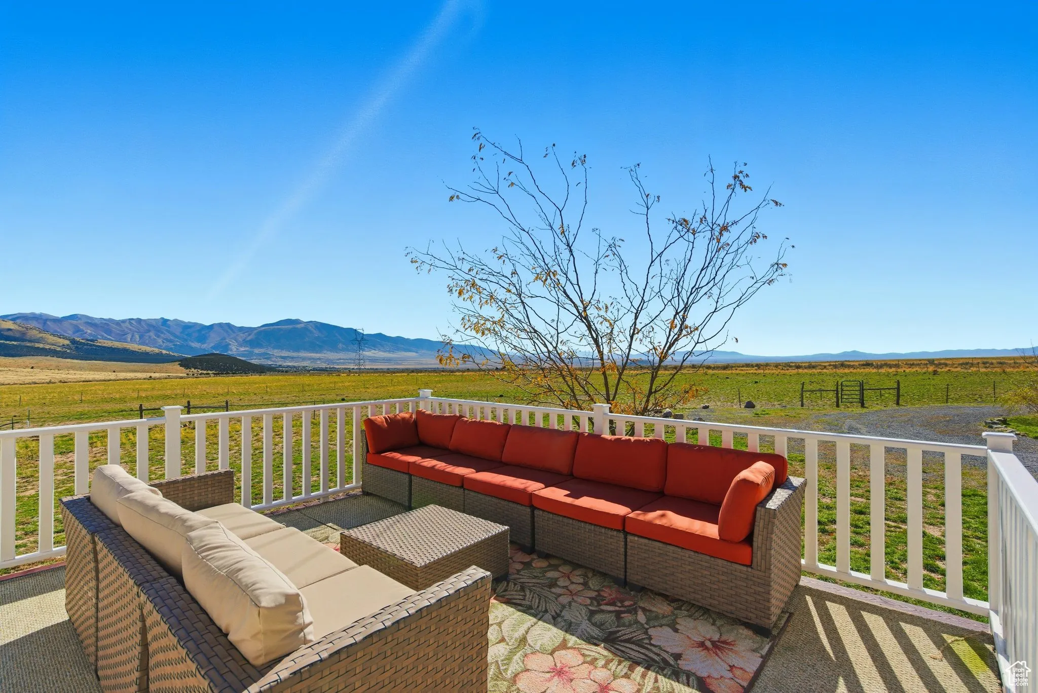 Deck featuring a view of countryside, a mountain view.