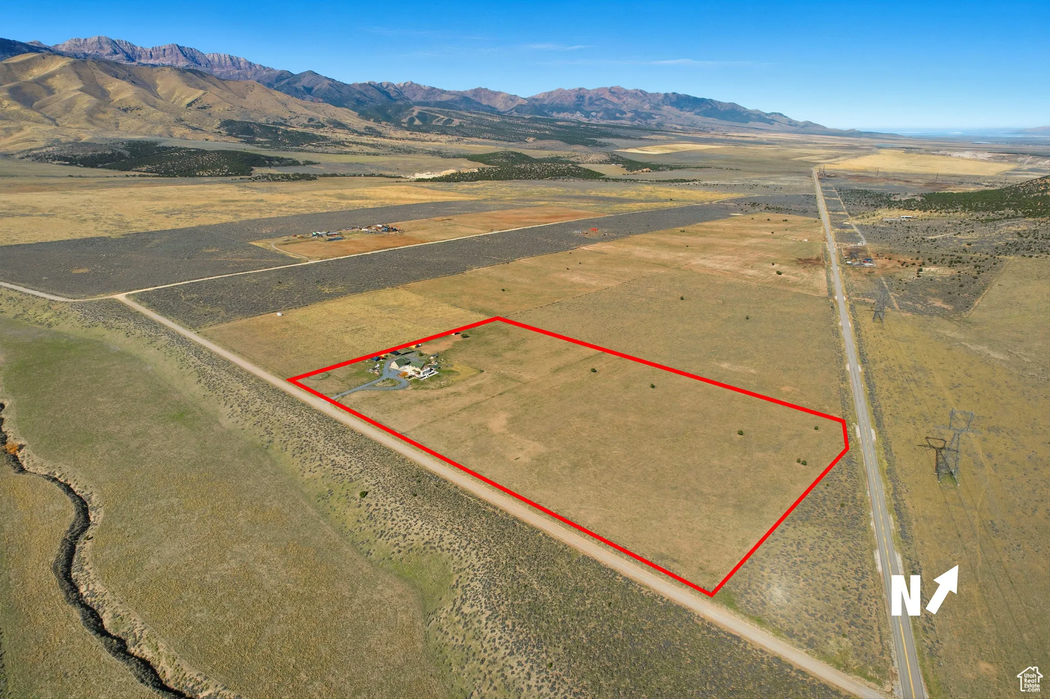 View of property boundaries highlighted and mountains, north east.