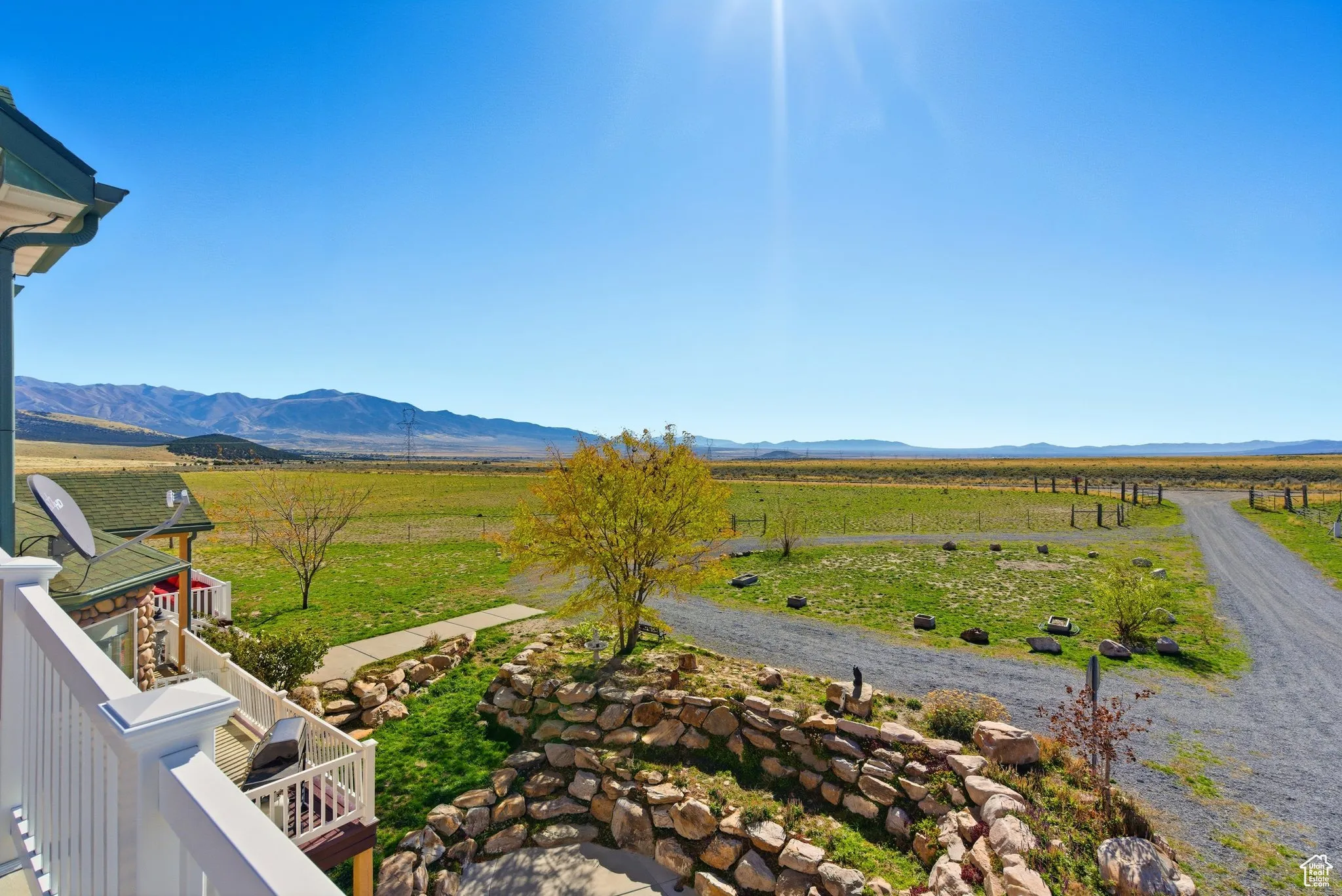 Mountain view from west side second floor bedroom balcony with rural landscape.