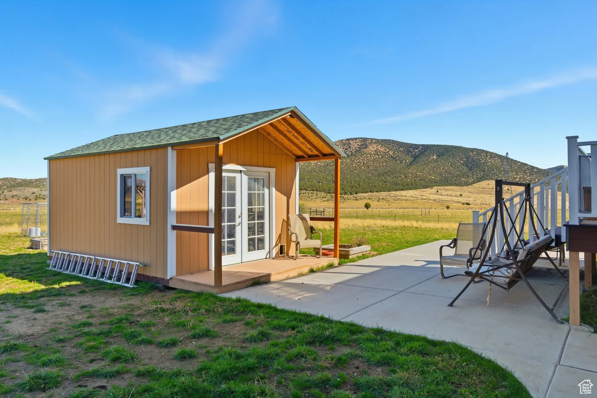 View of outbuilding, a mountain view, a view of countryside.