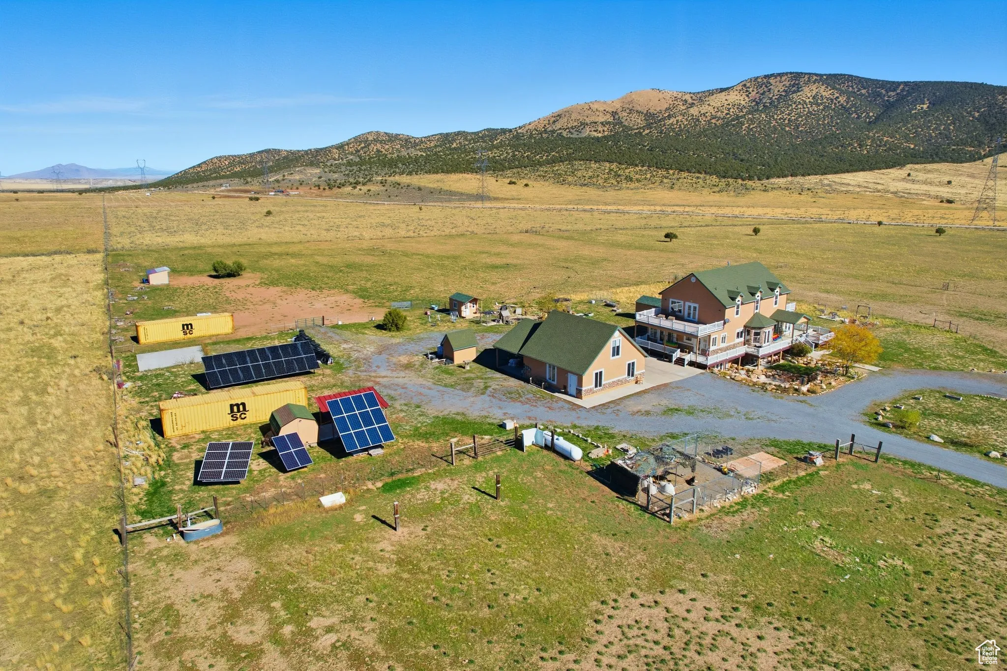 Overview of rural landscape featuring a mountain backdrop, north east.