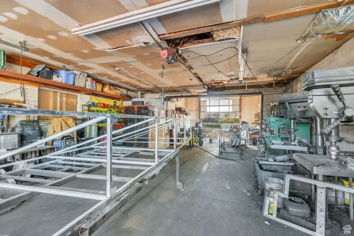 Gym featuring concrete flooring