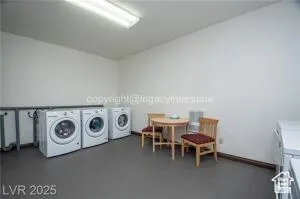 Washroom with washing machine and dryer