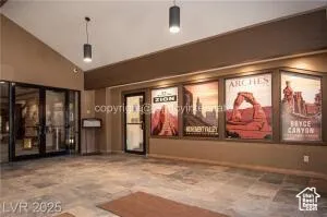 Common area with vaulted ceiling