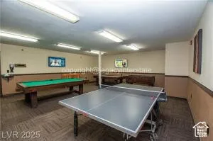 Rec room with billiards table