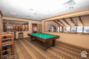 Rec room with billiards table