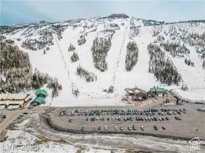Snowy aerial view with a mountain view
