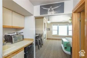 Kitchen featuring light countertops and a sink