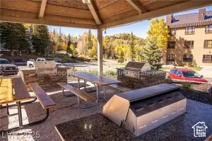 View of patio featuring an outdoor kitchen