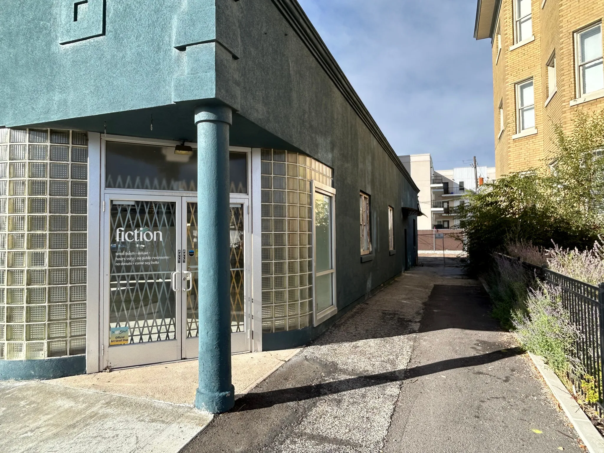 View of property exterior featuring french doors and stucco siding