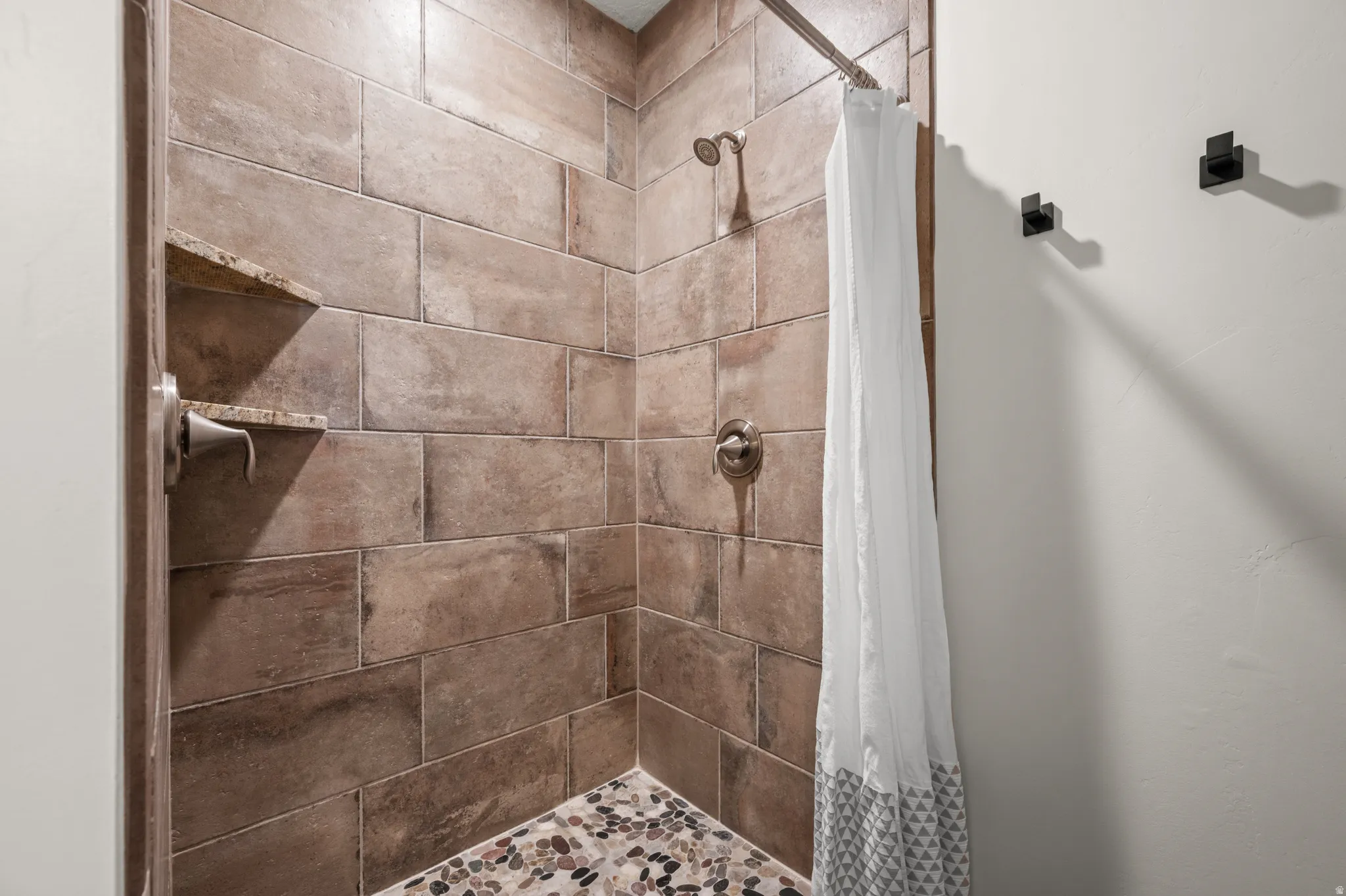 Bathroom with a shower stall