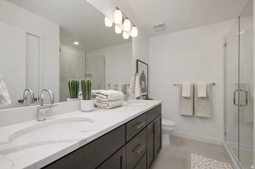 Dual sinks = relationship saver. Plus a walk-in shower that actually feels spa-worthy. *Model