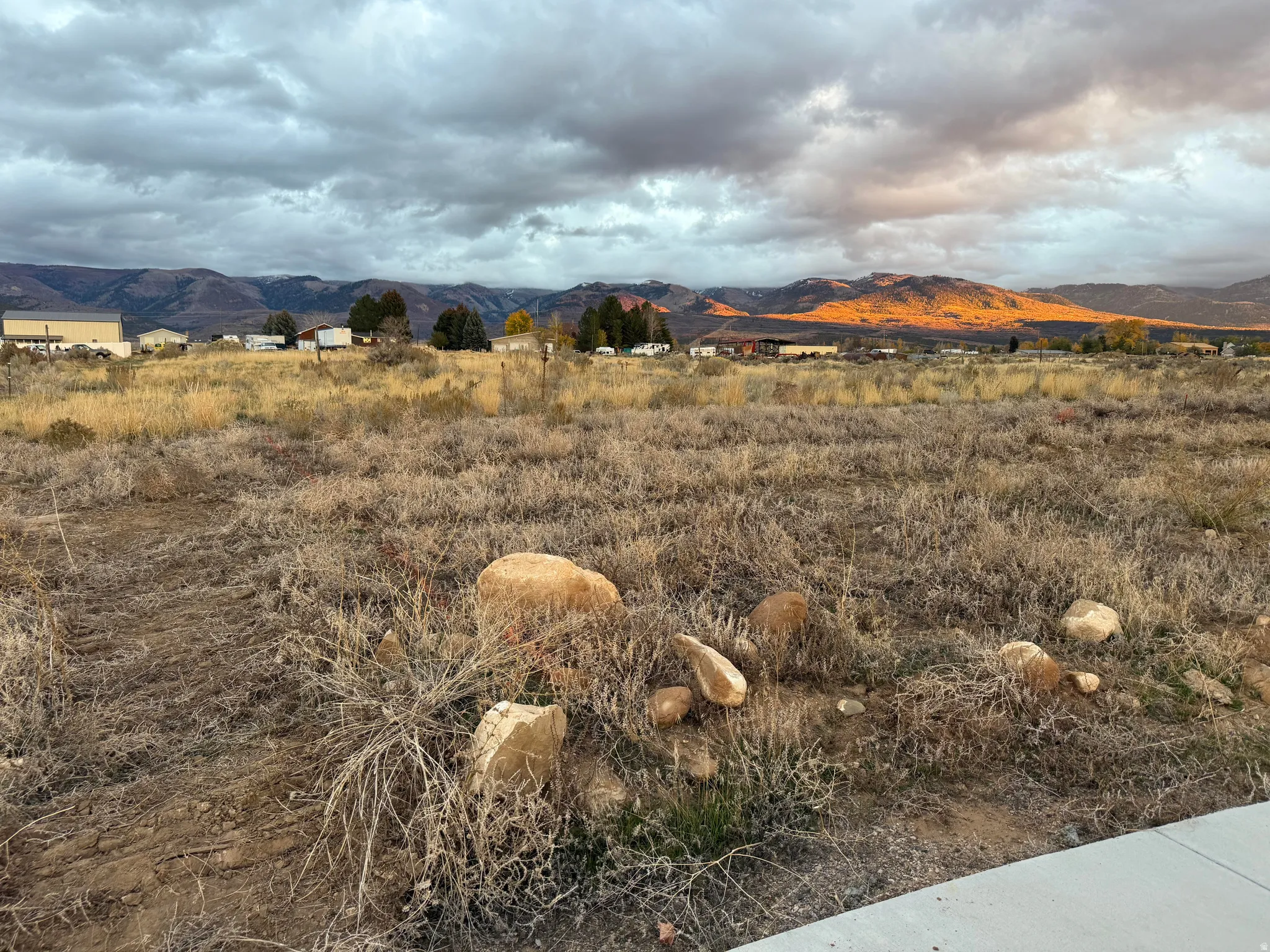 View of mountain background featuring rural landscape