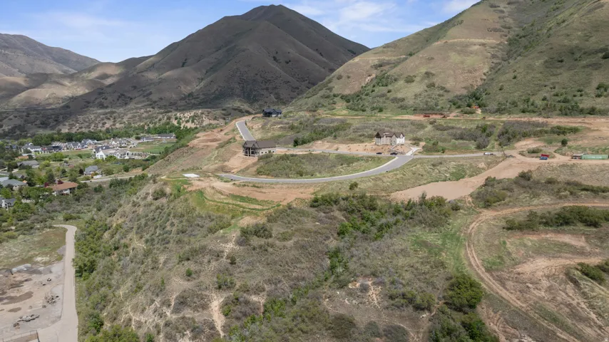 Mountainous terrain surrounding a developing residential area