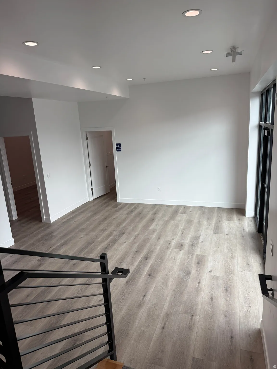 Unfurnished room featuring recessed lighting and light wood-type flooring