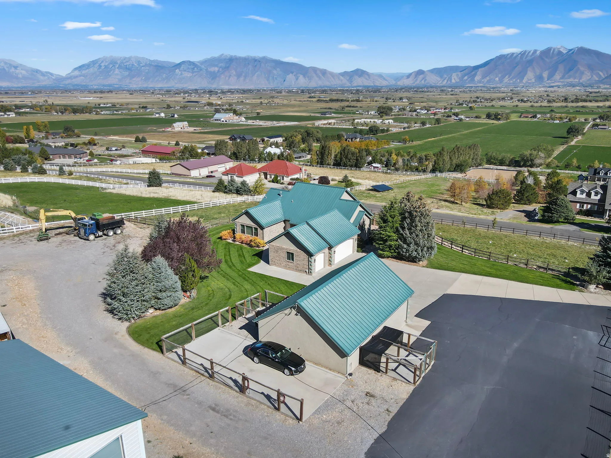 28 X 39 detached 2 - 4 car garage with kennels and RV parking in rear.