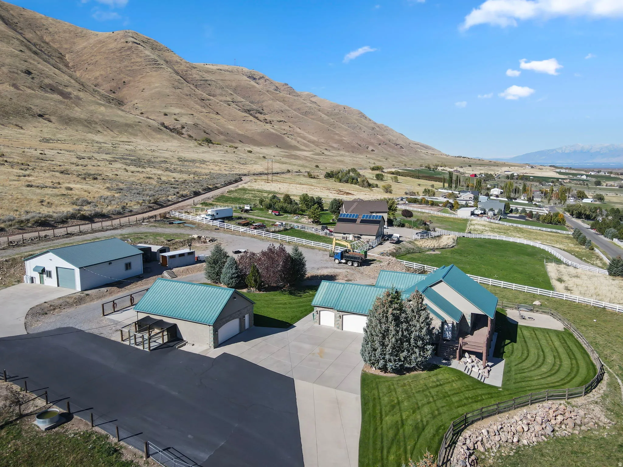 Home with attached 3 car garage,  28 X 39 detached 2 - 4 car garage with RV parking in rear, and 40 X 40 workshop
