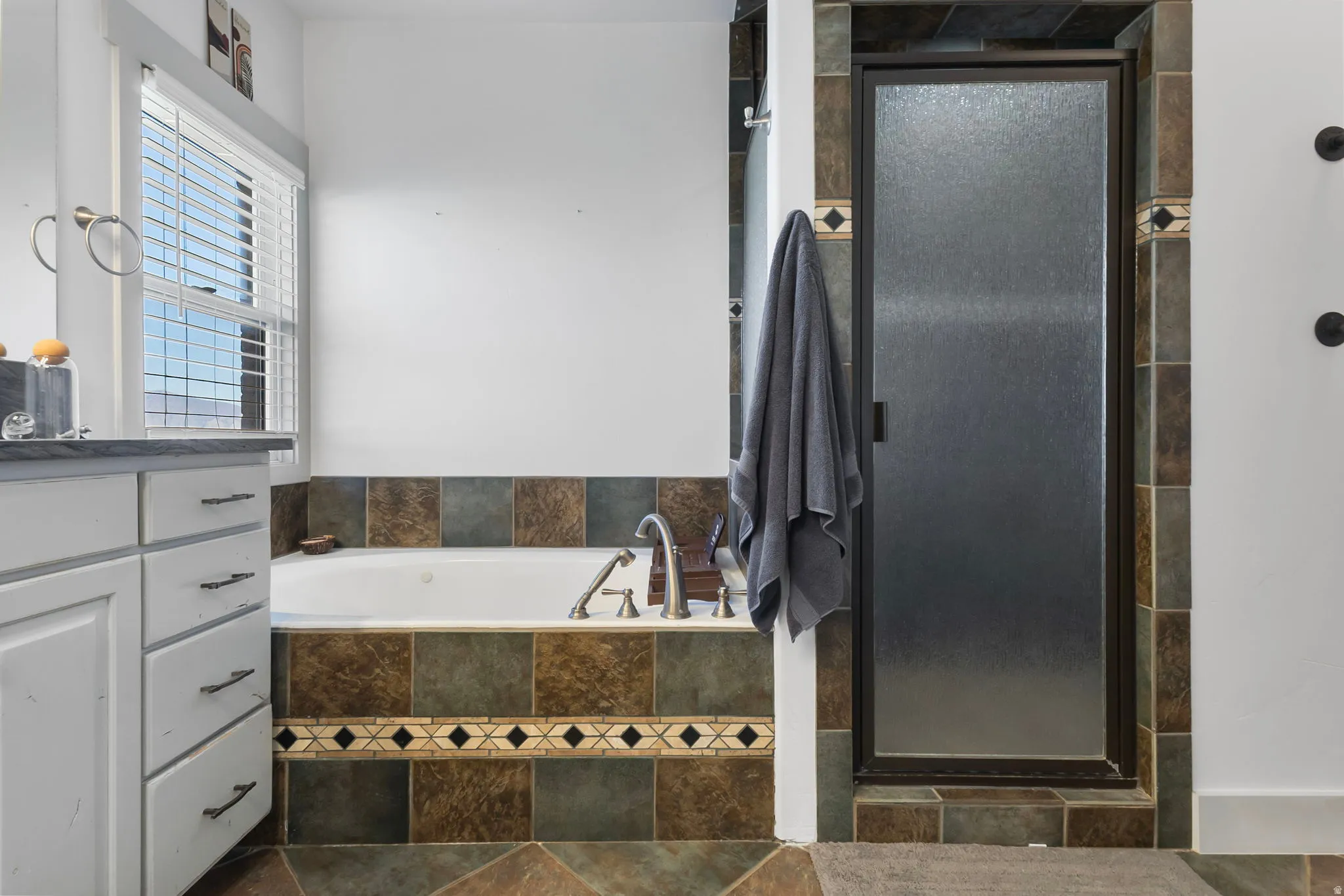Separate tub and shower.