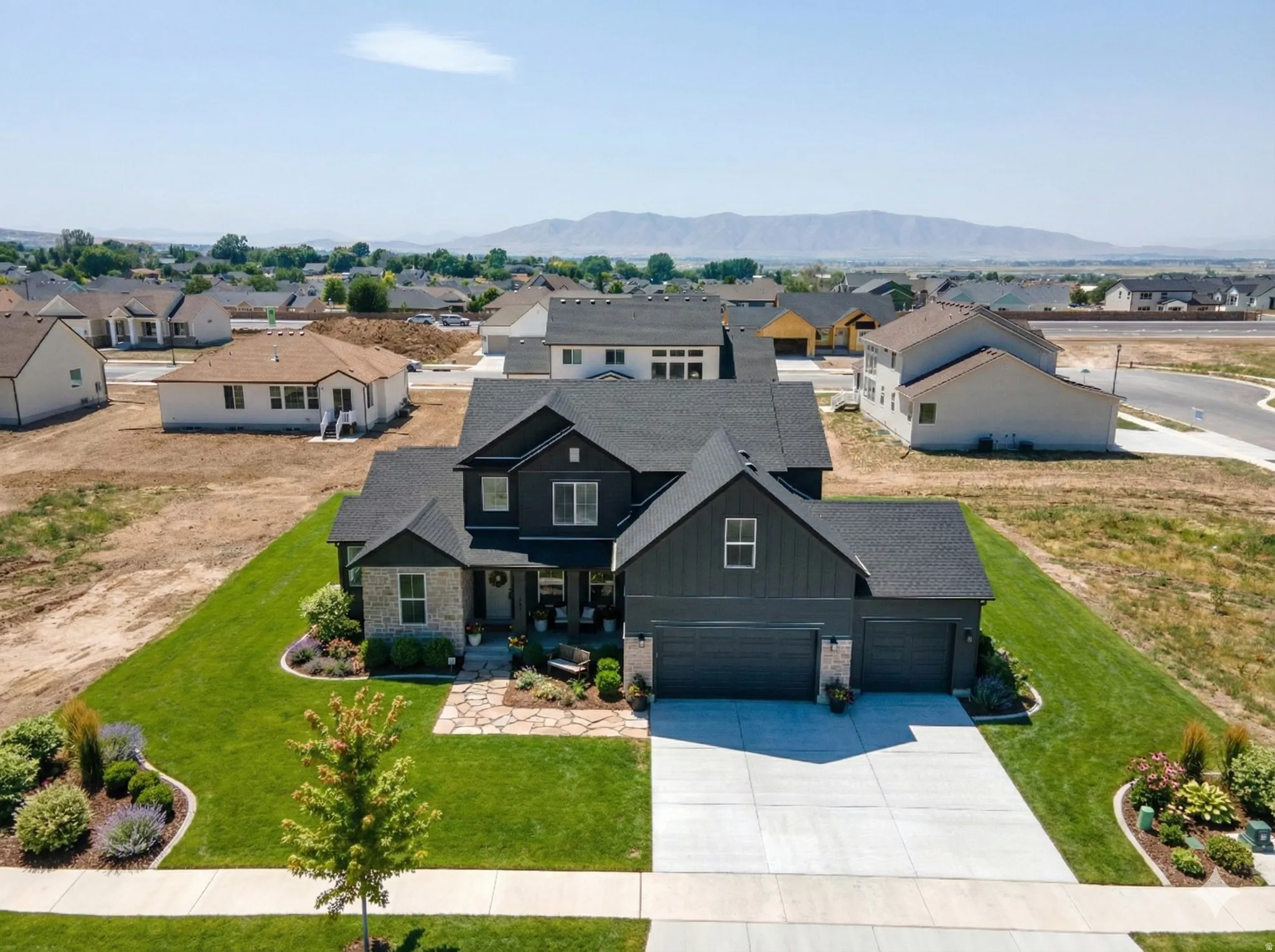 Aerial perspective of suburban area with mountains