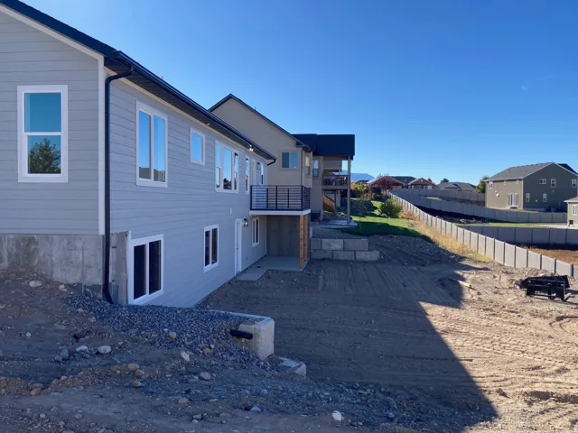 Rear elevation with beck and covered patio