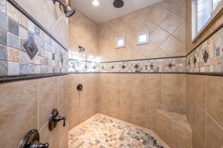 Bathroom with tiled shower