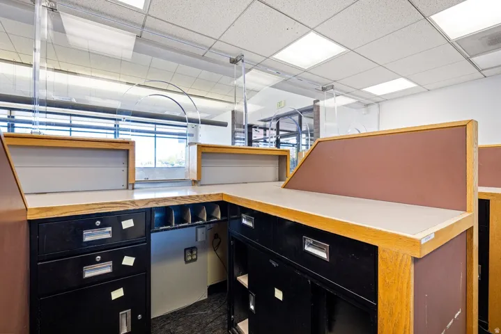 Home office featuring a drop ceiling